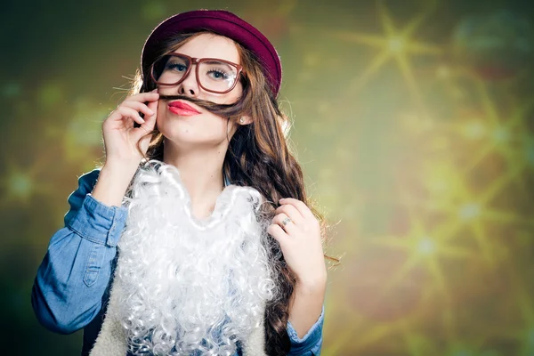 Girl holding hair as mustache — ストック写真