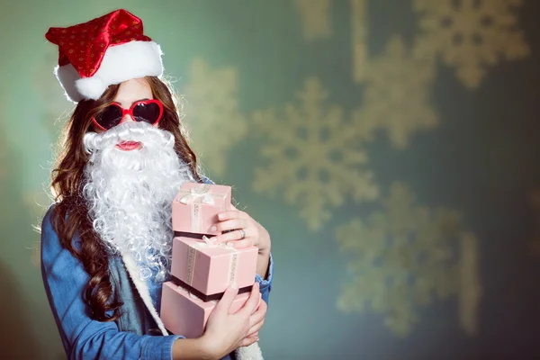 Hipster girl holding gift boxes — Stockfoto