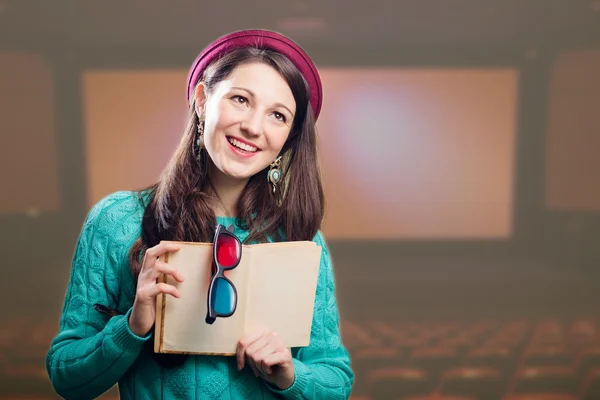 Brunette girl with 3d glasses and book — Stok fotoğraf