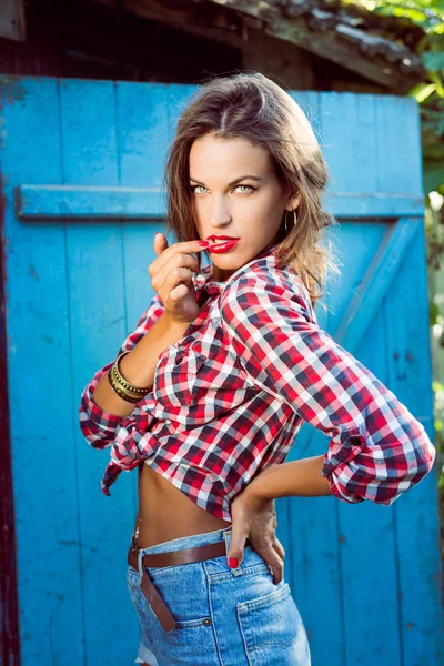 Hipster lady in checked shirt — Stockfoto