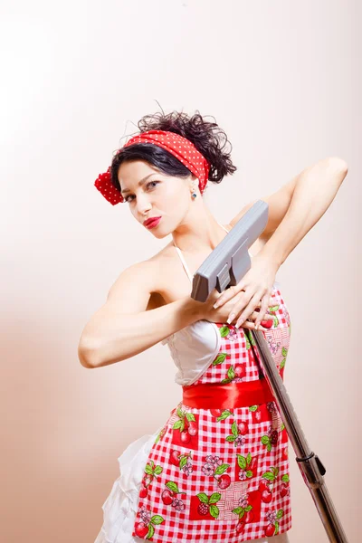 Funny pinup using vacuum cleaner — Stock Photo, Image