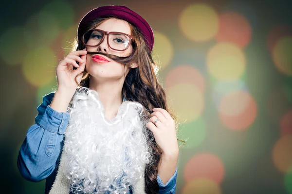 Female in hat, glasses, false beard — Stock Photo, Image