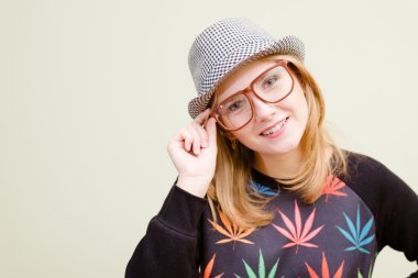 stylish hipster girl in glasses