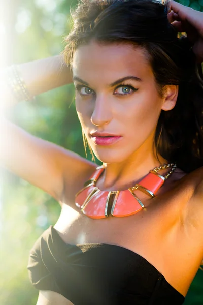 Sensual brunette wearing necklace — Stock Fotó