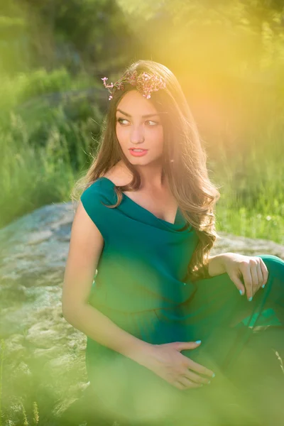 Pretty lady wearing green dress — Stock Photo, Image