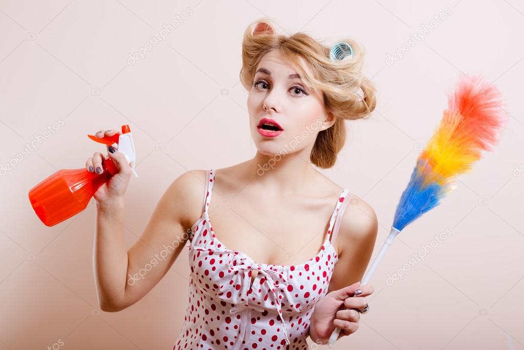 girl with red spray and rainbow duster