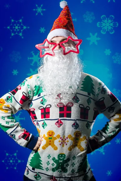 Funny hipster young man wearing Santa beard and funny glasses — Stock Photo, Image