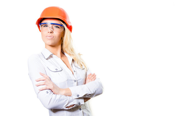 Young Attractive  Female Wearing Hard Hat and Safety Glasses