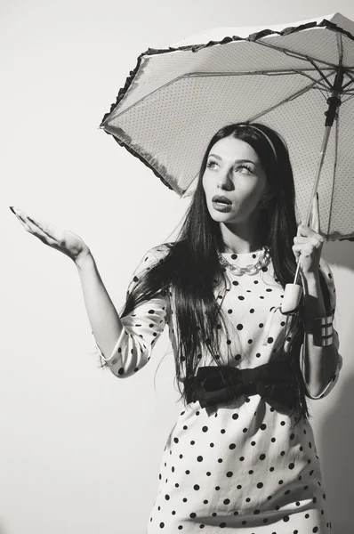 Young happy pinup style woman with umbrella — Stock Photo, Image