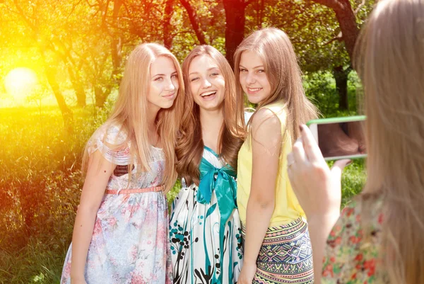 Friends congratulating a girl on her birthday — Stock Photo, Image