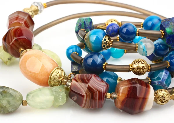 Close-up of colorful natural precious gems jewelry — Stock Photo, Image