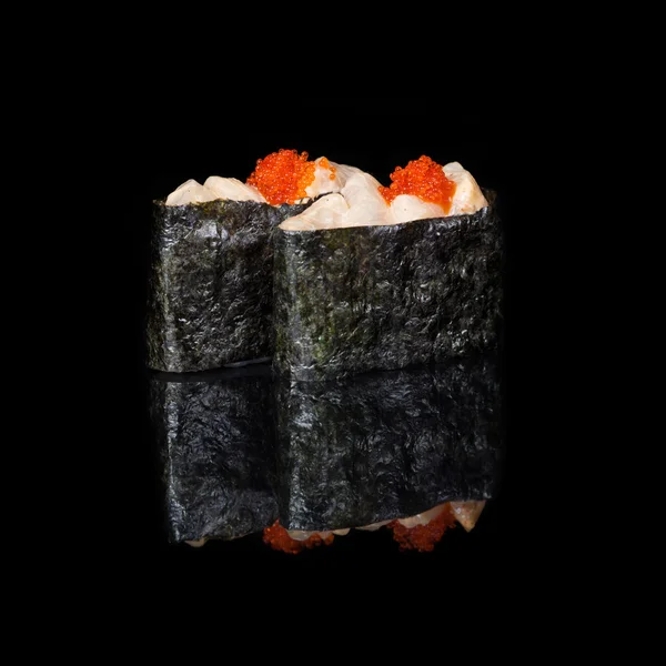 Rolls with pieces of fish and flying fish roe — Stock Photo, Image