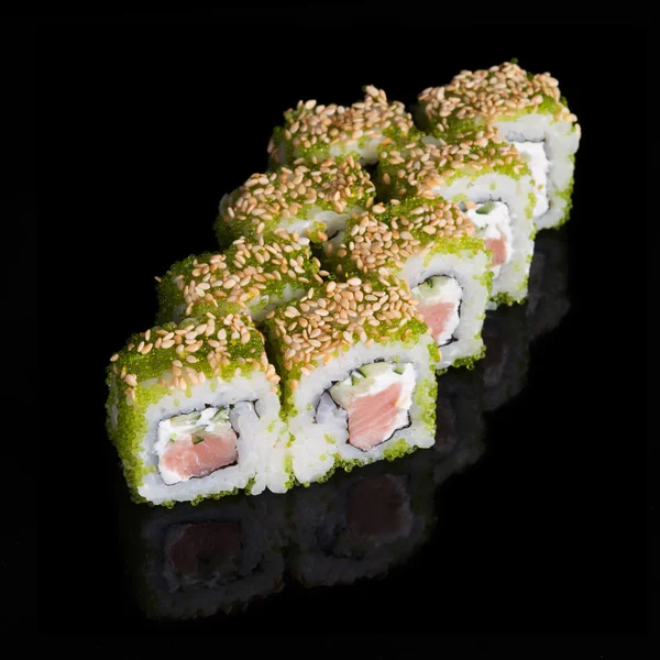 Sushi rolls with salmon, cucumber and flying fish roe — Stock Photo, Image