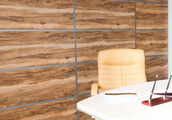 Office interior design with wall of synthetic wood panels Stock Image