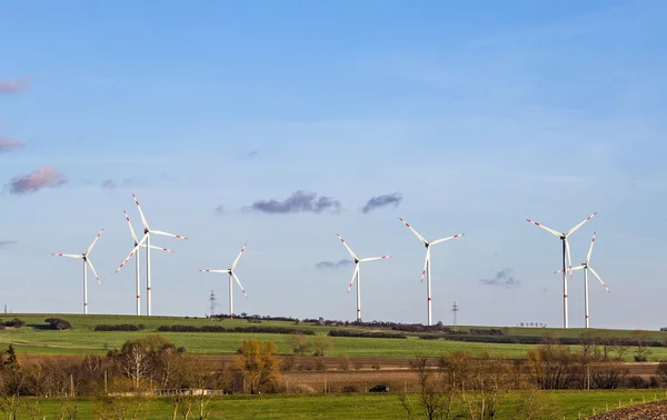 Wind generators in scenic landscape — Stock Photo, Image