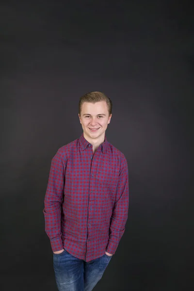 Cute sixteen year old boy in studio — Stock Photo, Image