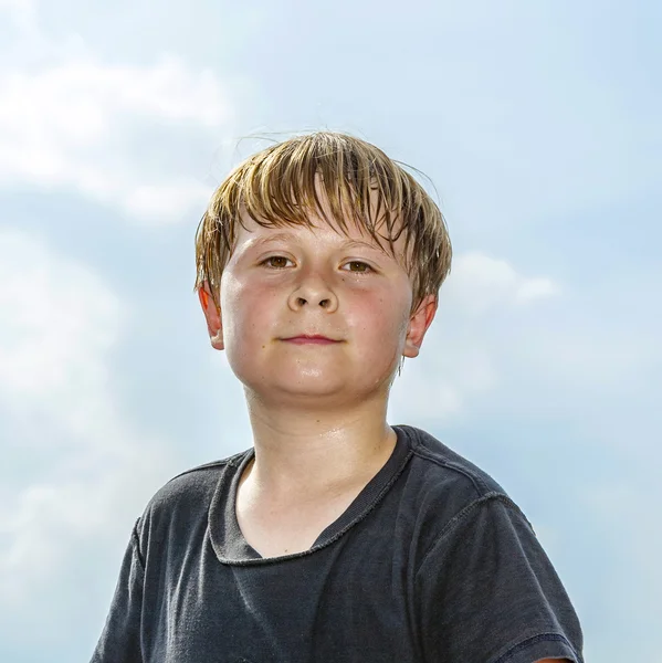 Sweating boy after sport looks confident — Stock Photo, Image