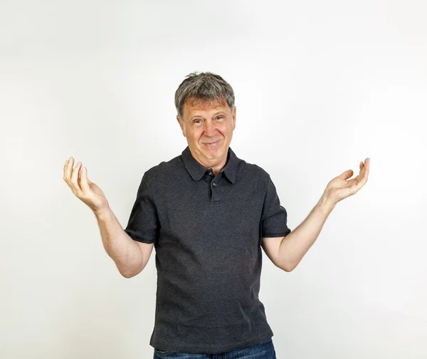 Amigável sorrindo e gesticulando homem — Fotografia de Stock