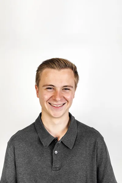 Cute smiling boy posing in studio — Stock Photo, Image