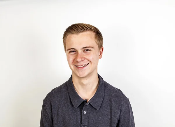 Cute smiling boy posing in studio — Stock Photo, Image