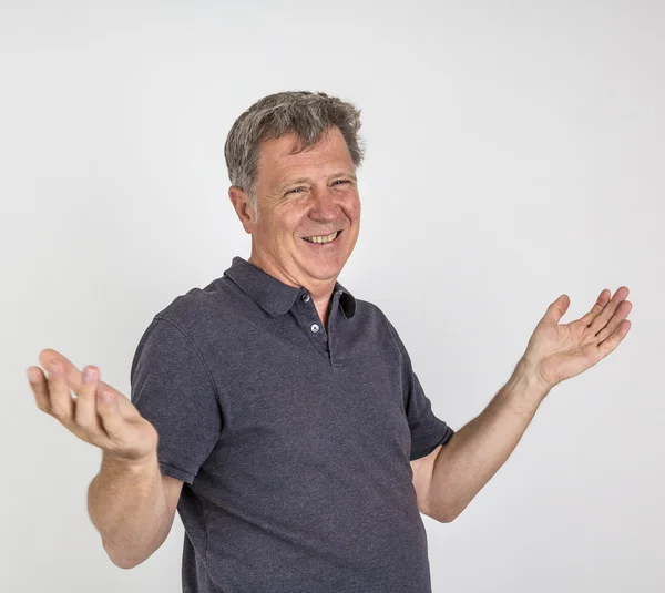 Portrait of gesturing mature man — Stock Photo, Image