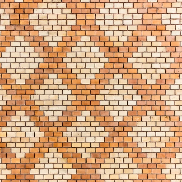 Muro di mattoni decorato con motivi geometrici — Foto Stock
