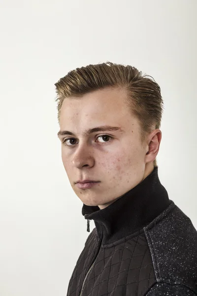Handsome teenage boy in black shirt — Stock Photo, Image