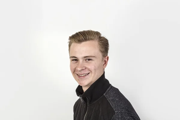 Handsome teenage boy in black shirt — Stock Photo, Image