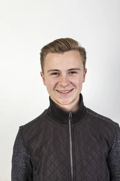 Handsome teenage boy in black shirt — Stock Photo, Image