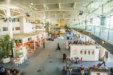 people in the terminal of Marseille Provence Airport in Marseill clipart