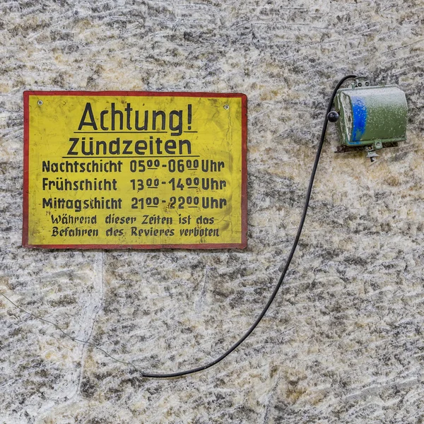 Warning sign ignition time in a mine — Stock Photo, Image