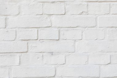 Beyaza boyanmış eski model tuğla duvar deseni