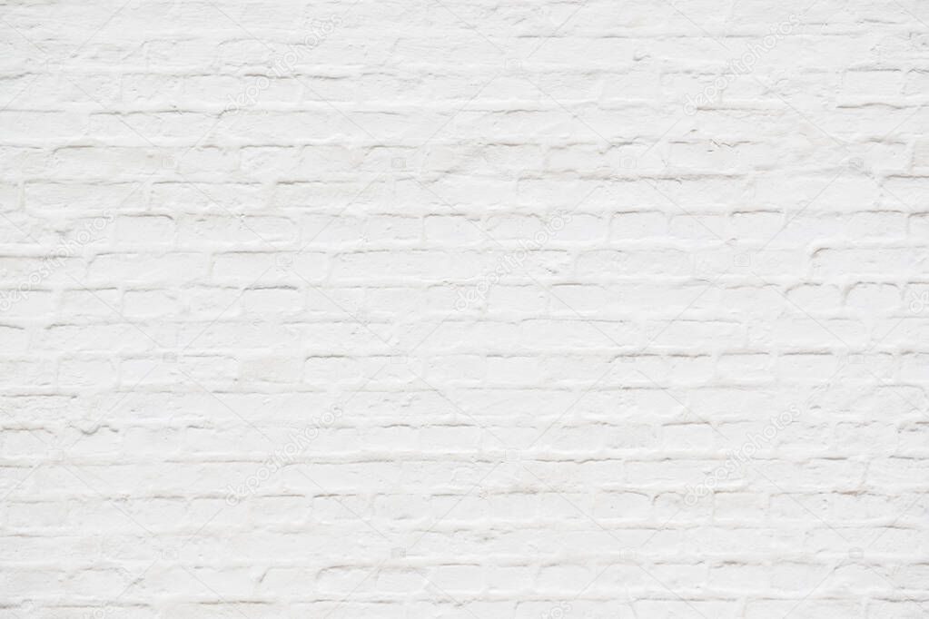 Abstract weathered textured  white brick wall background