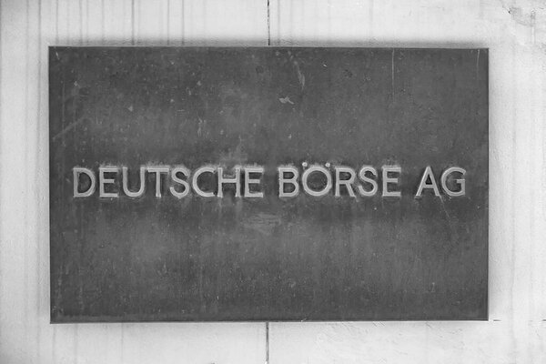 Frankfurt, Germany - June 13, 2021: Close-up of sign with writing Deutsche Boerse AG At the entrance of Frankfurt stock exchange. One of the most important stock markets in the world.