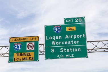 BOSTON, USA - SEP 26, 2017: signage logan airport and south station at interstate 90 and 93 by entering Boston.
