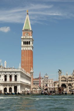 venice, Italy - July 1, 2021: view to San Marco square with gondolas at Doge's palace and the promenade in Venice, Italy.