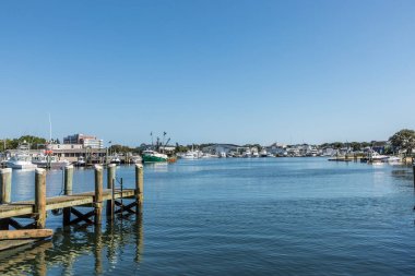 BARNSTABLE, USA - SEP 24, 2017: modern yachts and fishing trawlers  at the pier in Barnstable harbor. Lobster fishing was in former times the most important industry in Barnstable, USA.