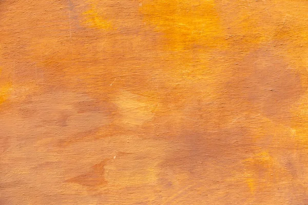 明るいオレンジ 典型的な地中海の色で黄色の石膏壁の背景 — ストック写真