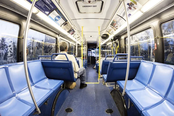 People in the downtown Metro bus in the evening — Stock Photo, Image