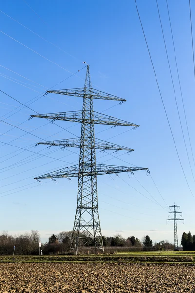 Högspänning pyloner tower — Stockfoto