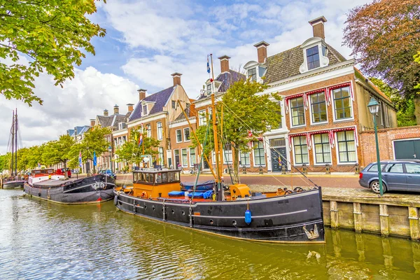 Boats in a canal in Harlingen — Stock Photo, Image