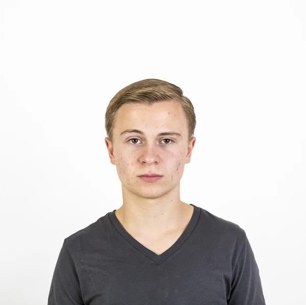 Handsome teenage boy looking at the camera — Stock Photo, Image