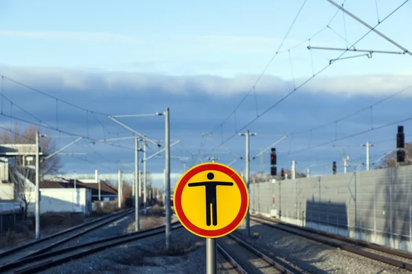 Sign Beware of trespassing at train station — Stock Photo, Image