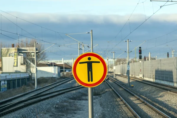 Sign Beware of trespassing at train station — Stock Photo, Image