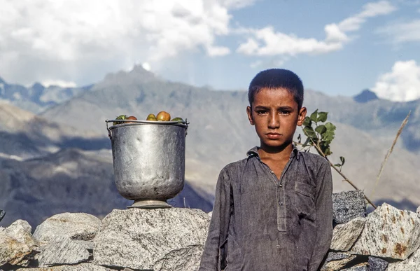 Portrait of unknown poor working boy — Stock Photo, Image