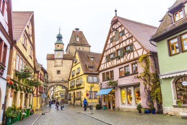 Tourists at the market place of Rothenburg ob der Tauber clipart