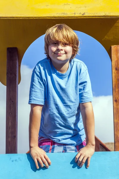 Portrait of happy teenager at a playground — Stock Photo, Image