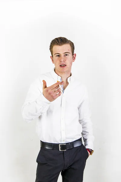 Smart looking teenage boy in white shirt — Stock Photo, Image