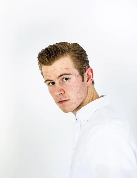 Smart looking teenage boy in white shirt — Stock Photo, Image