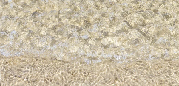 Pattern of water at the sandy beach — Stock Photo, Image